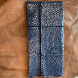 Urban expression blue snakeskin bag